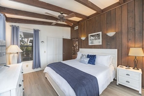 King size bed with 43" smart TV in master bedroom