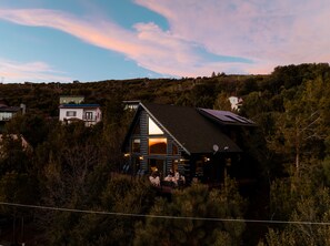 A-frame cabin with gorgeous views and a wrap around deck.  Firepit and patio heaters to snuggle up outside during the winter:)