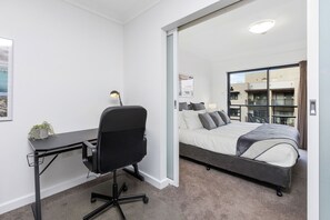 This well-appointed room features a comfortable workspace, perfect for staying productive during your visit.