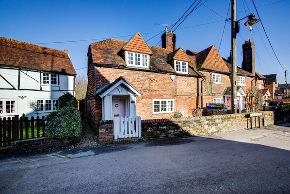 Front of the cottage. Street parking available 