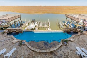 Large infinity pool overlooking the canal