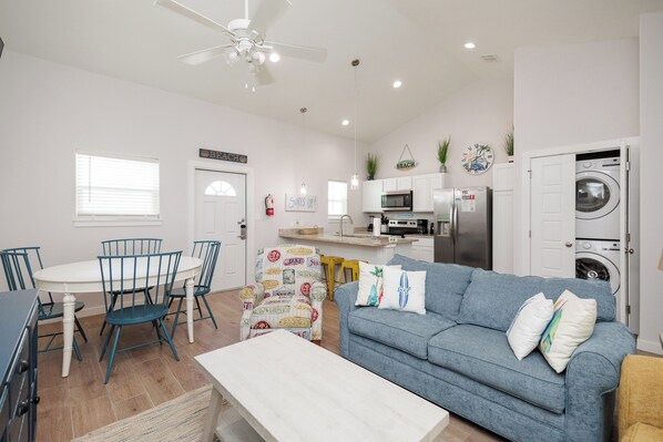 Elegant open-concept layout combines living, dining, and kitchen spaces