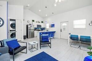 Open concept living, dining, and kitchen area