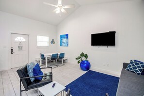 Open concept living area over looks the dining area