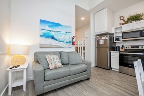Charming open concept living, dining, and kitchen area