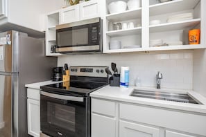 Kitchen area with stainless steal appliances