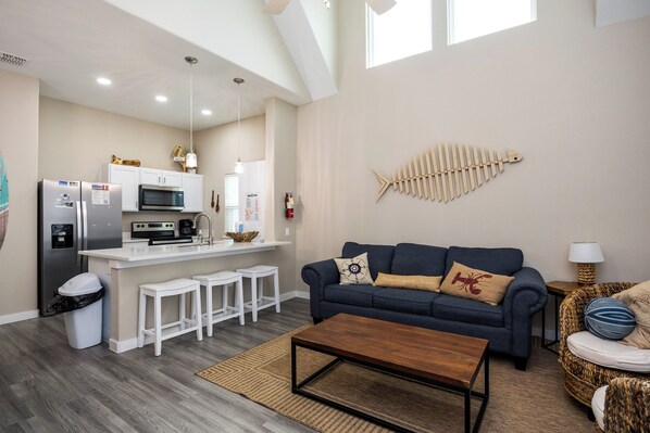 Living area with queen size murphy bed and queen size sleeper sofa