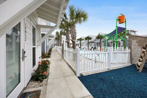 Front entrance to the property with a pool view