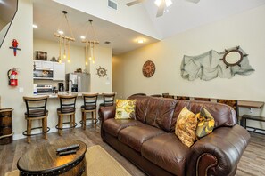 Rest your sea legs in the open concept living, dining and kitchen area
