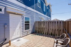 Private patio off the master bedroom with plenty of space to unwind after a day at the beach