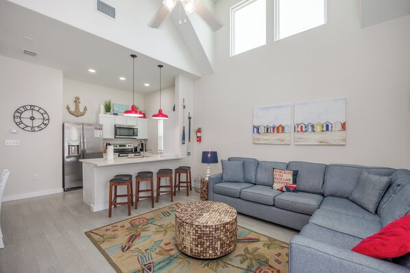 A bright, airy open-plan living space designed for easy flow and plenty of fun socializing