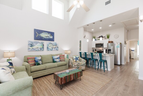 Living area with queen size sleeper sofa and flat screen TV