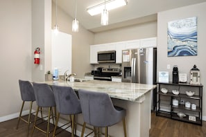 Fully equipped kitchen with coffee bar