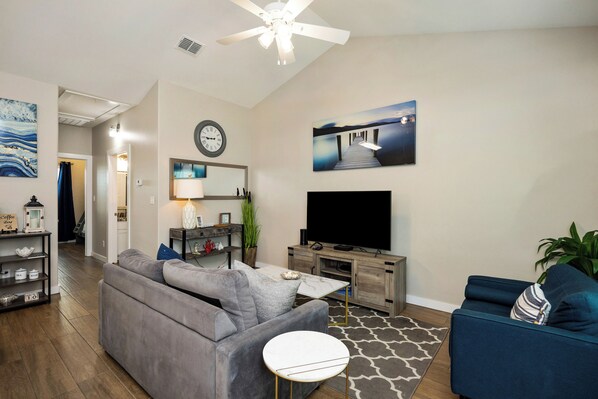Living room area with comfortable seating for the entire family