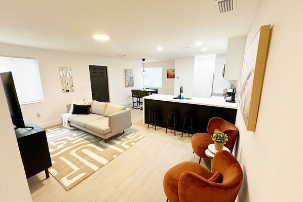 Open concept living room kitchen and Dinning room.