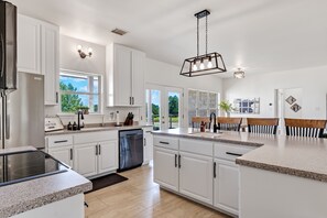 Well-stocked kitchen with all-electric appliances, plenty of counter space