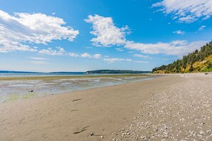Enjoy a walk on the beach with mountain and island views!