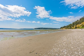 Enjoy a walk on the beach with mountain and island views!