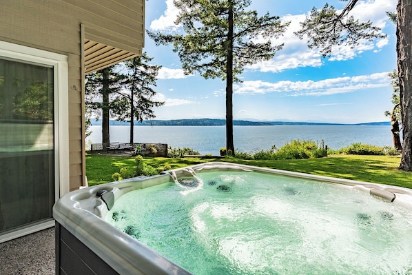 The epic view of whales migrating can be seen from this hot tub!