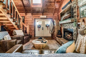 Living Area with 55" TV and fireplace.