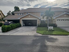 15031 unit 2201 garage door open no car on driveway. Main entrance on left side.