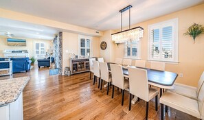 Elegant dining space with seating for ten plus a breakfast bar