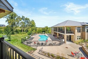 Enjoy the HEATED pool!  You can also use the clubhouse covered patio.  The fitness center is in the lower level.