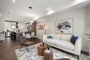 Guests will be invited to enjoy 
- Four level home 
- Four bedrooms 
- Four and a half bathrooms 
- Three separate living spaces 