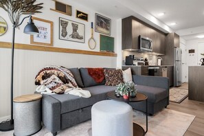 Immerse yourself in the Old West with all the comforts of modern living in this unique condo, complete with stunning city views.
