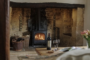 Relax by the wood burning stove on cooler evenings
