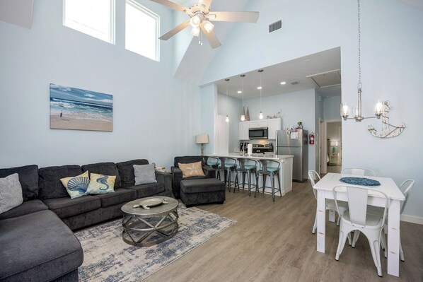 Open concept living, kitchen, and dining area