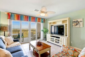 Seamless transition from the living room to the balcony with breathtaking ocean views