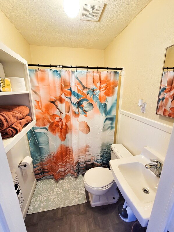 bathroom with hot tub