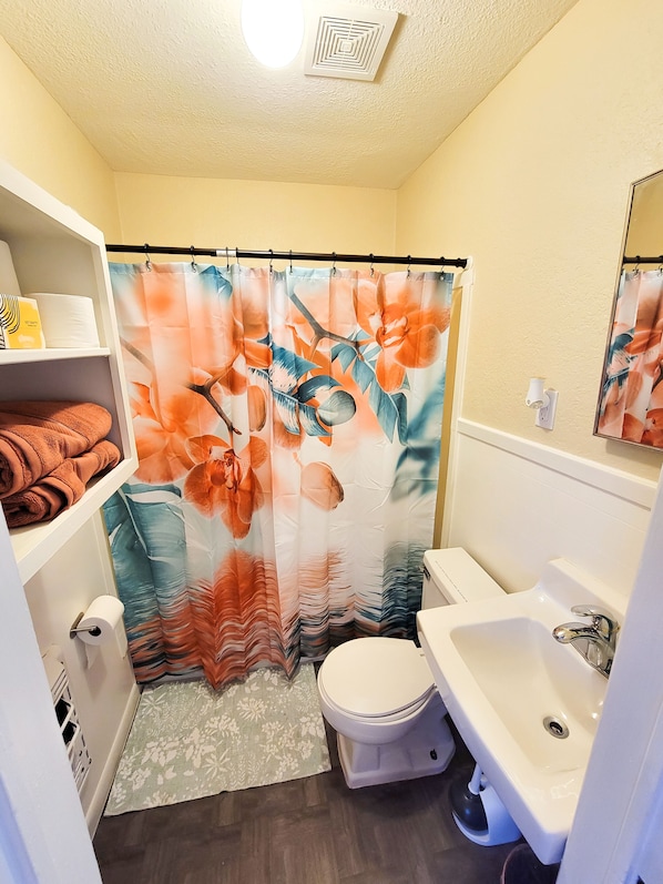 bathroom with hot tub