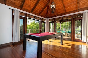 The dining table cleverly converts to a pool table so all the family can play together and create memories.