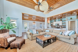 The Pink Flamingo features a large, open-concept living and dining area.