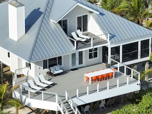 Back deck off the living room - stairs to private beach.  