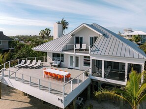 Back deck off the living room - stairs to private beach.  