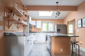 Spacious Kitchen with ample storage and natural light.