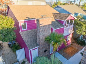 A drone shot of our home.  No shared walls here and a private backyard. 