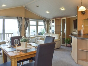 Open plan living space | Sunset Lodge, Llanddulas