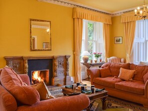 Relax in front of a roaring fire | Creag-Ard House, Aberfoyle