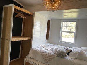 Bedroom for 3 guest, with trundle bed, closet open