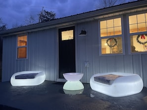 Back of the house, LED furniture. Chargers are inside the house, under the tv