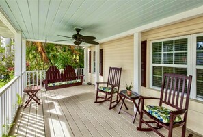 Grab an iced tea, watch the neighbors stroll past, and enjoy the Florida breezes on the shaded front porch.