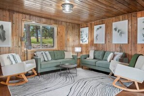 Open living area with comfortable couch and stellar views outside!