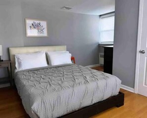 bedroom 2: Queen size bed with closet.