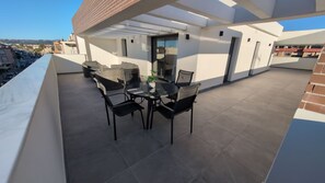 The spacious terrace surrounding the penthouse offers breathtaking views 