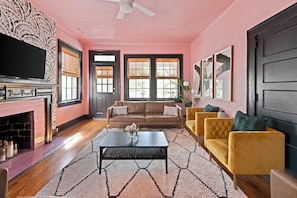 Professionally designed living room space with a Smart TV!