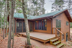 Cabin Exterior | Lake Access/Views | Wood-Burning Fire Pit | Charcoal Grill